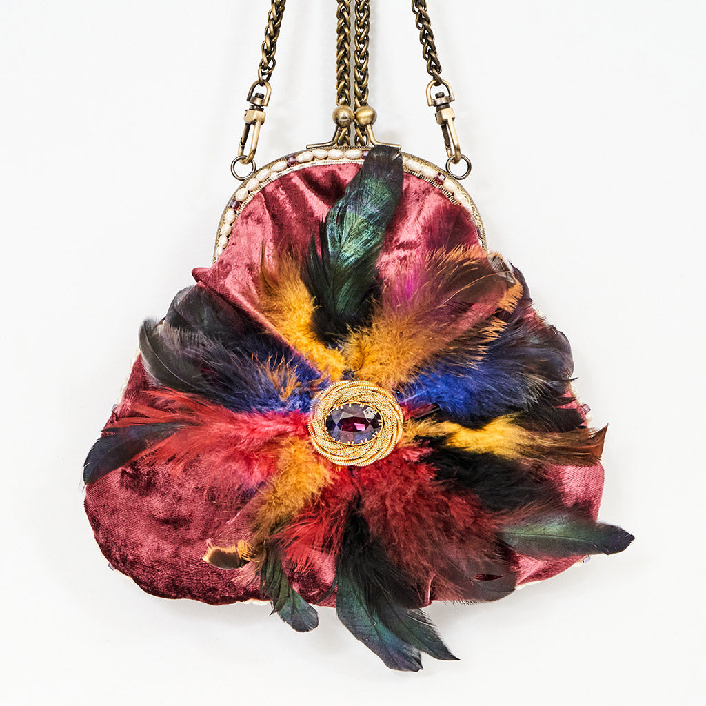 Plumb velvet & multicolour feather handbag with a pearl and amethyst trim.
