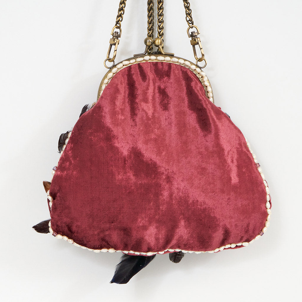 Plumb velvet & multicolour feather handbag with a pearl and amethyst trim.