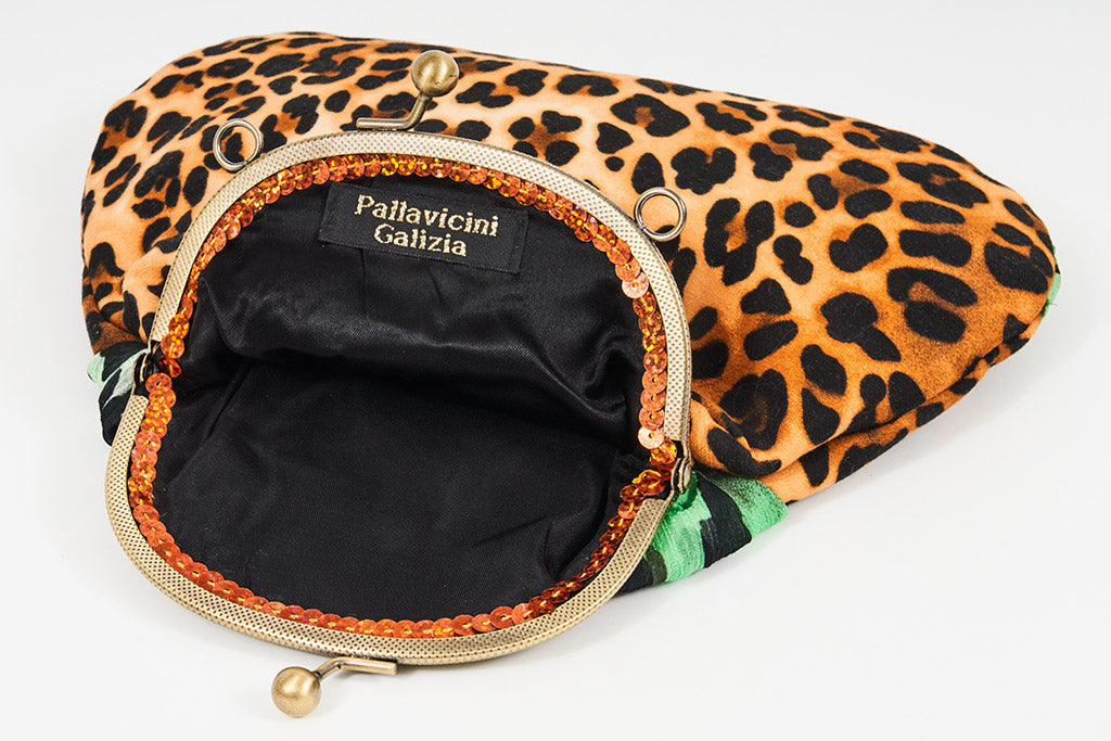 Meet Tabatha. A leopard print and green textile handbag with bronze rhinestones.