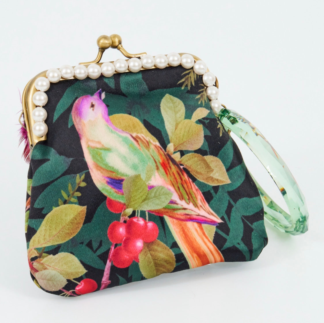 Meet Victoria, A bird inspired satin purse with pink feathers and jumbo pearls.