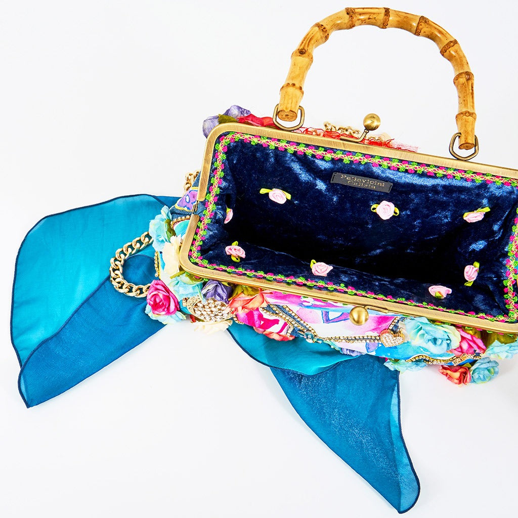 Meet Angelica. 100% handmade with denim, Louis Vuitton fabric, diamanté and flowers.