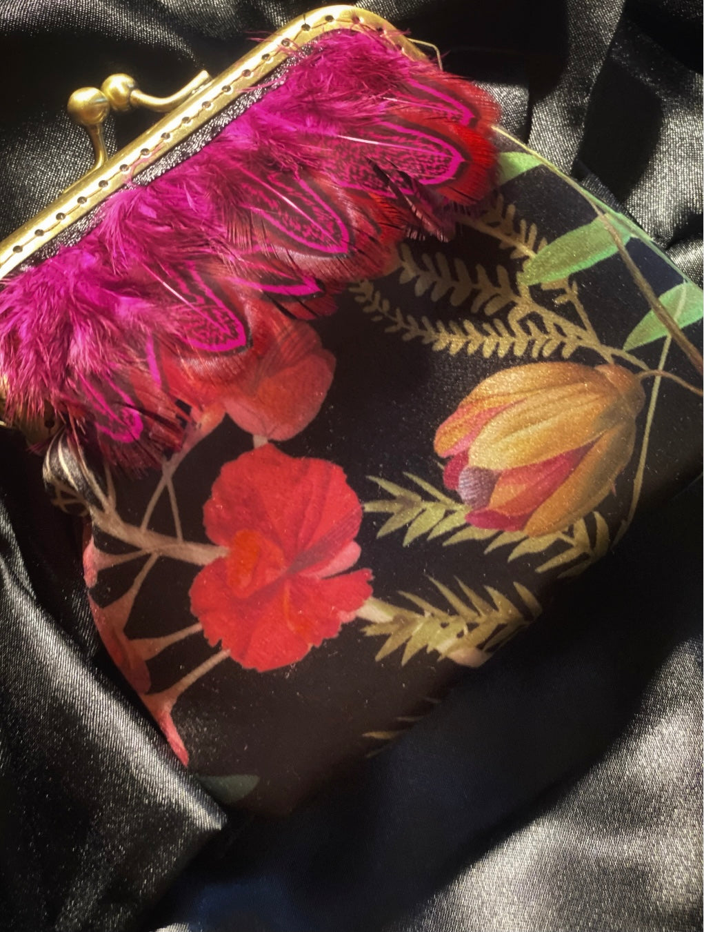 Meet Victoria, A bird inspired satin purse with pink feathers and jumbo pearls.