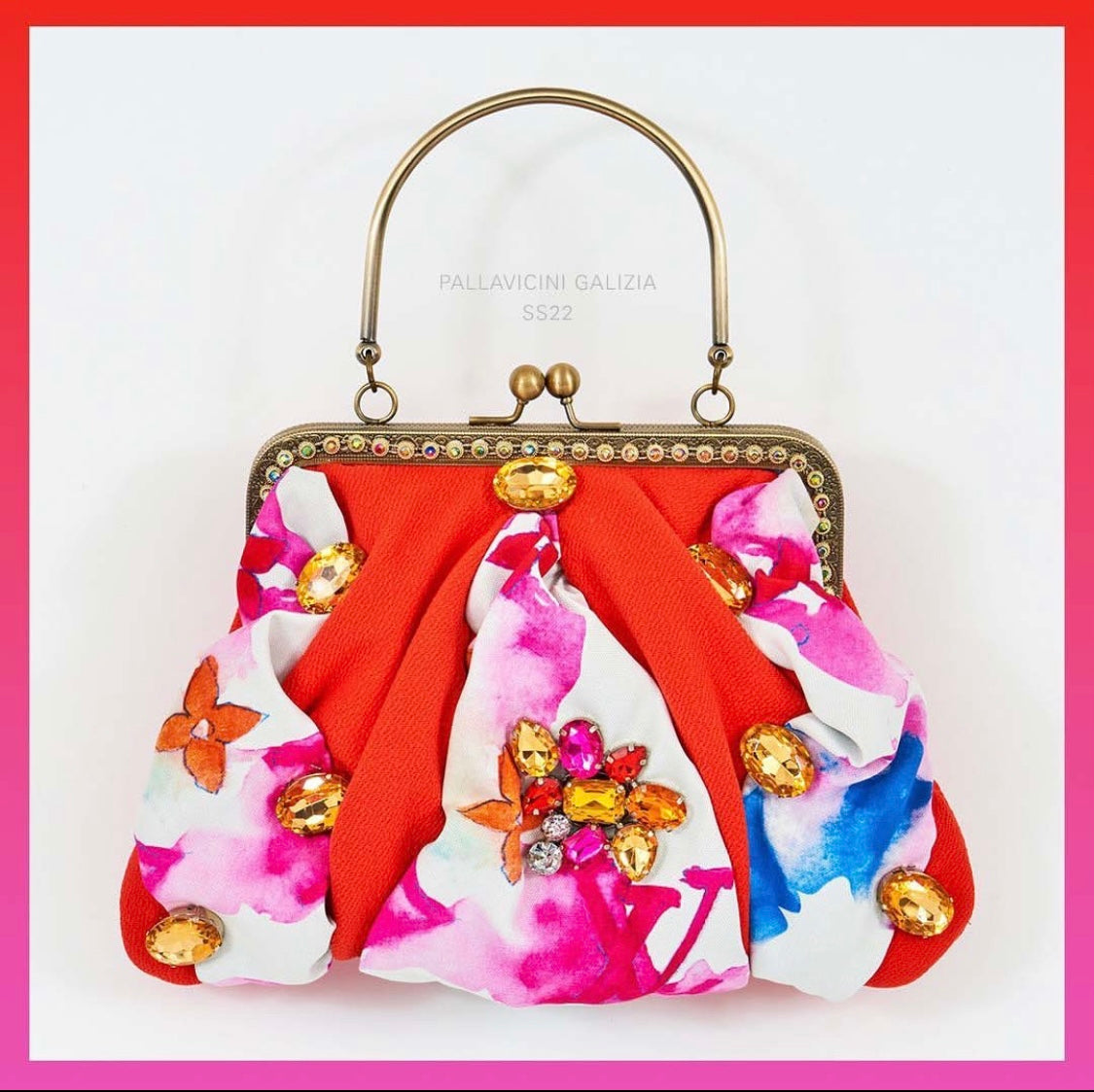Meet Chloe. An orange and Louis Vuitton textile bag with jumbo, statement diamanté.