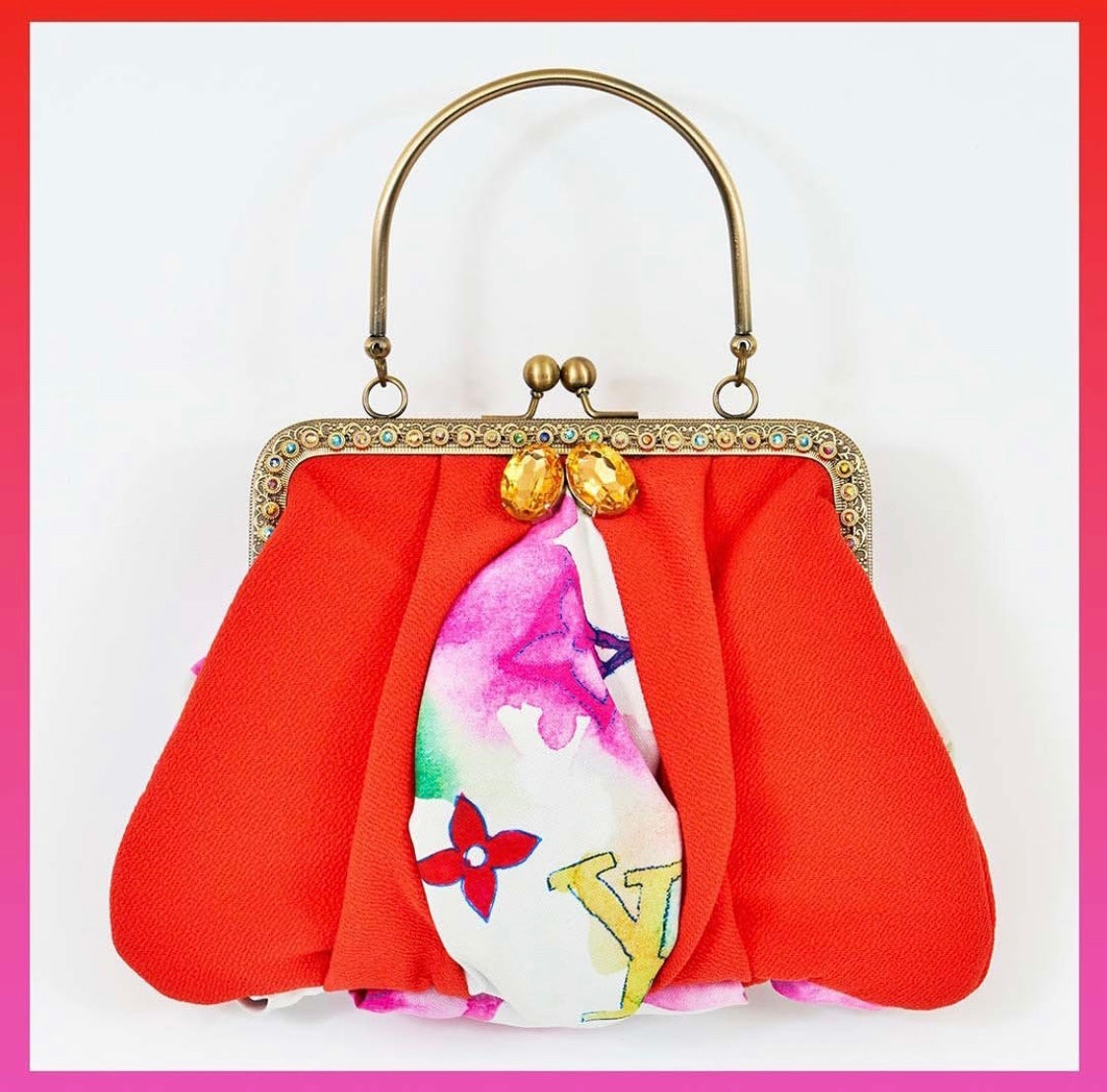 Meet Chloe. An orange and Louis Vuitton textile bag with jumbo, statement diamanté.