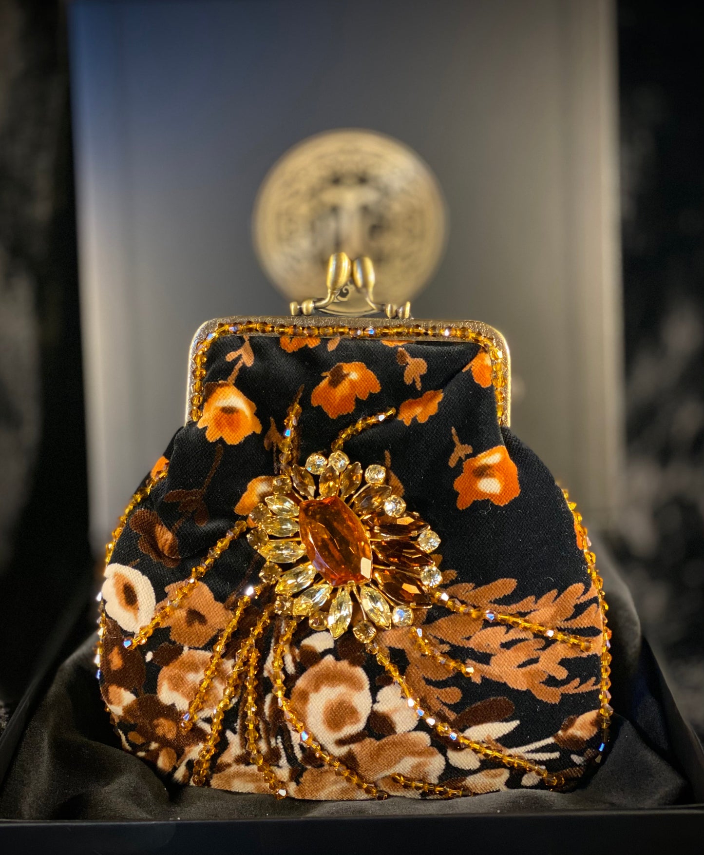 Meet Heather. A black, velvet wristlet purse with an antique centrepiece.