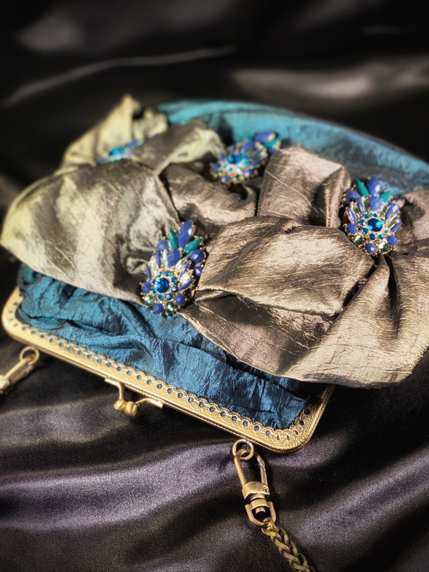 Meet Amalia. An emerald, blue and green silk bag with vintage embellishments