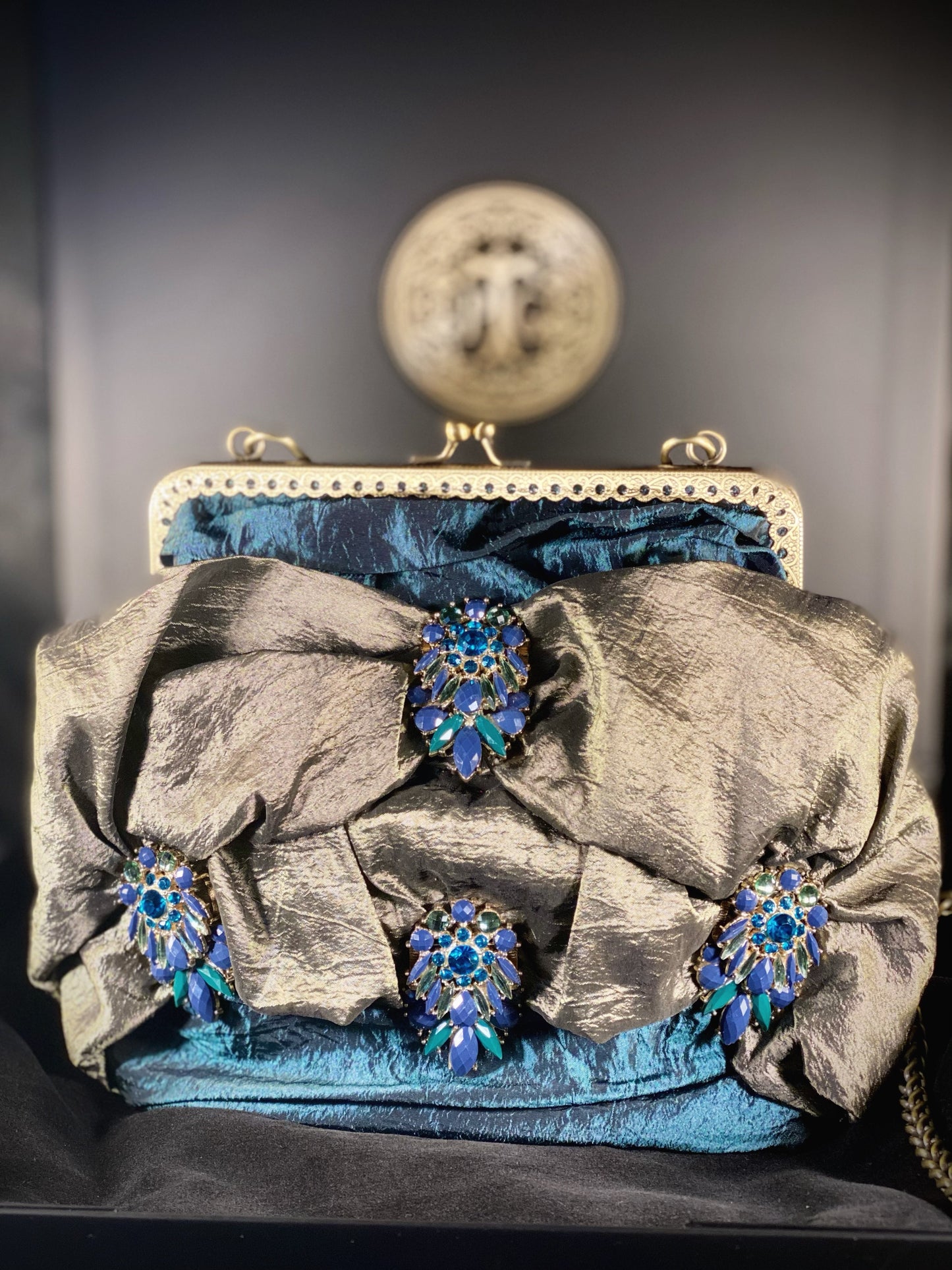Meet Amalia. An emerald, blue and green silk bag with vintage embellishments