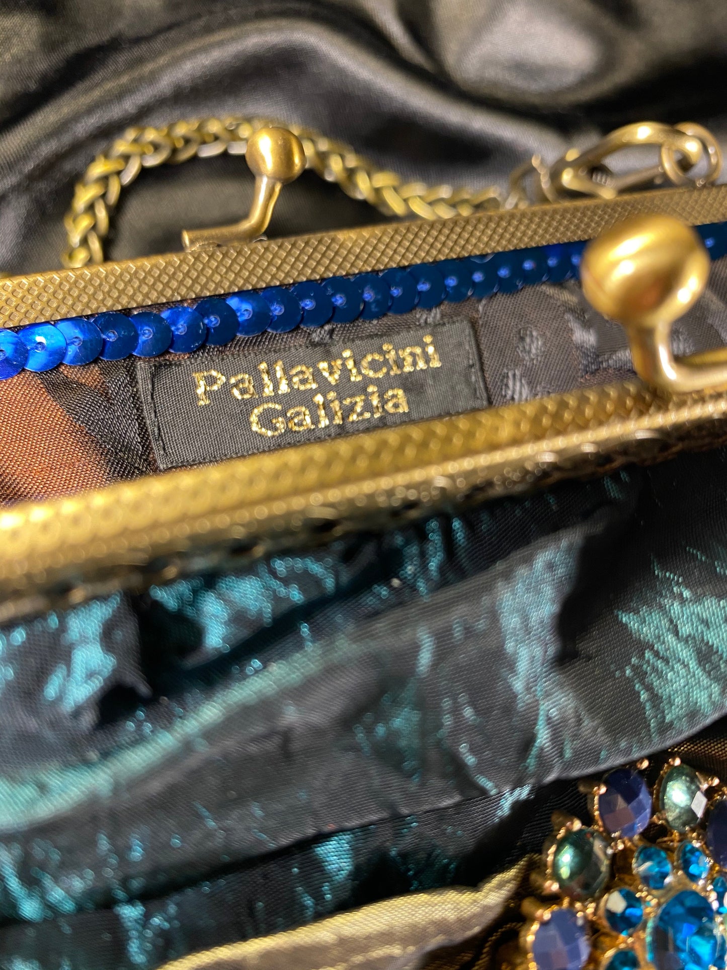 Meet Amalia. An emerald, blue and green silk bag with vintage embellishments