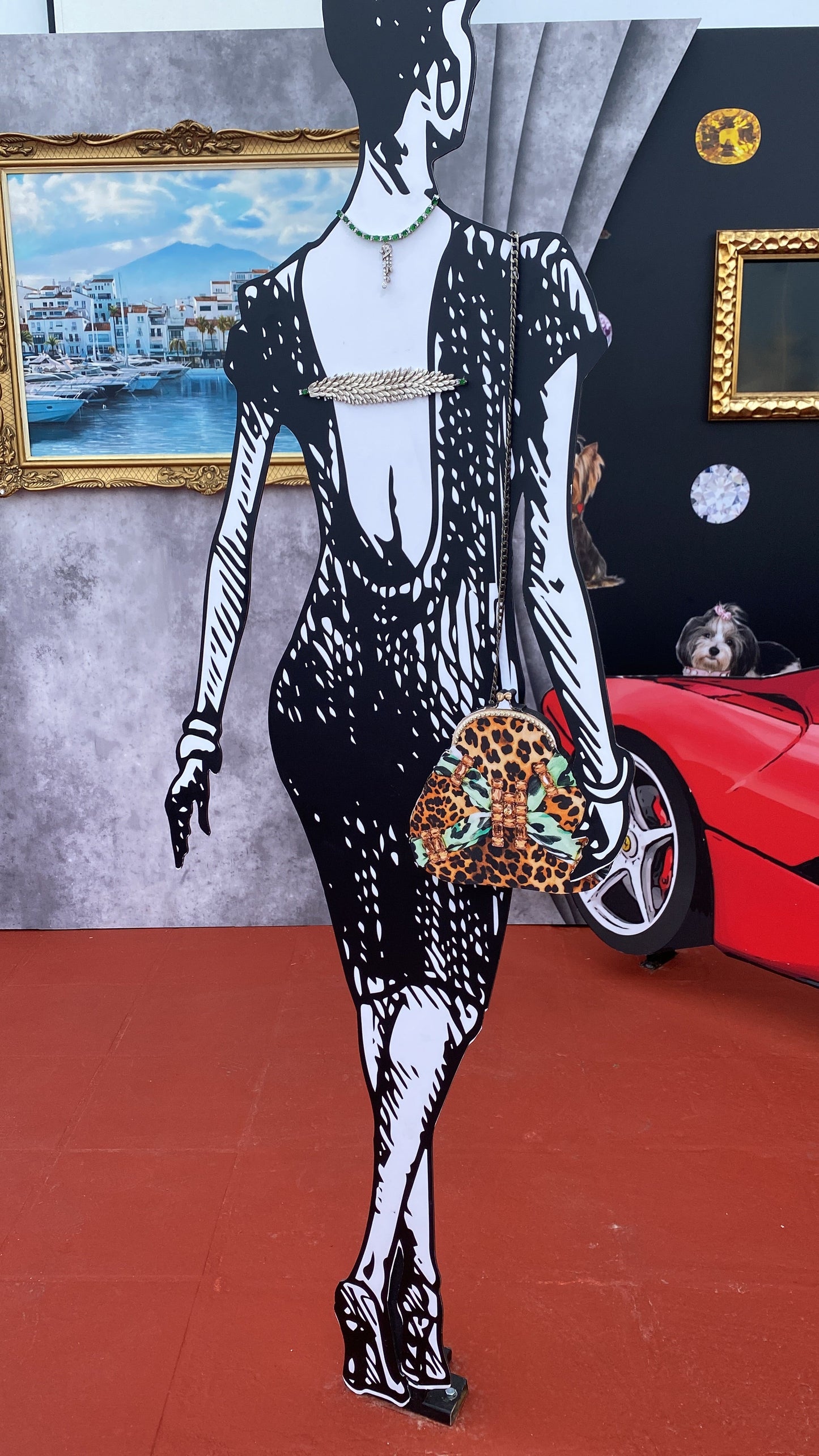 Meet Tabatha. A leopard print and green textile handbag with bronze rhinestones.