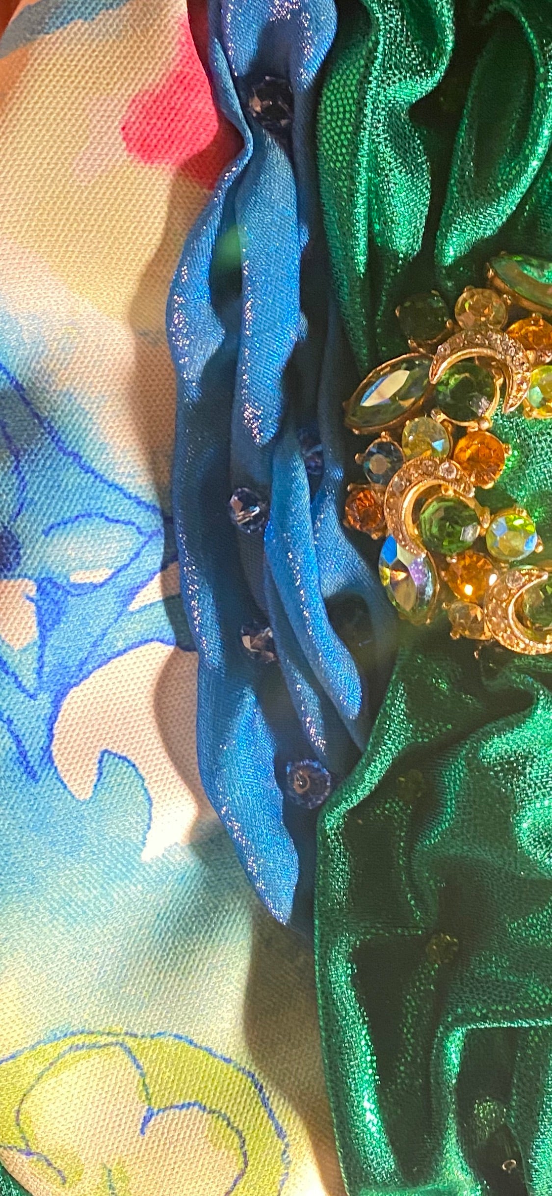 Meet Robyn. A shimmering green & Louis Vuitton fabric handbag with a diamanté vintage centrepiece.