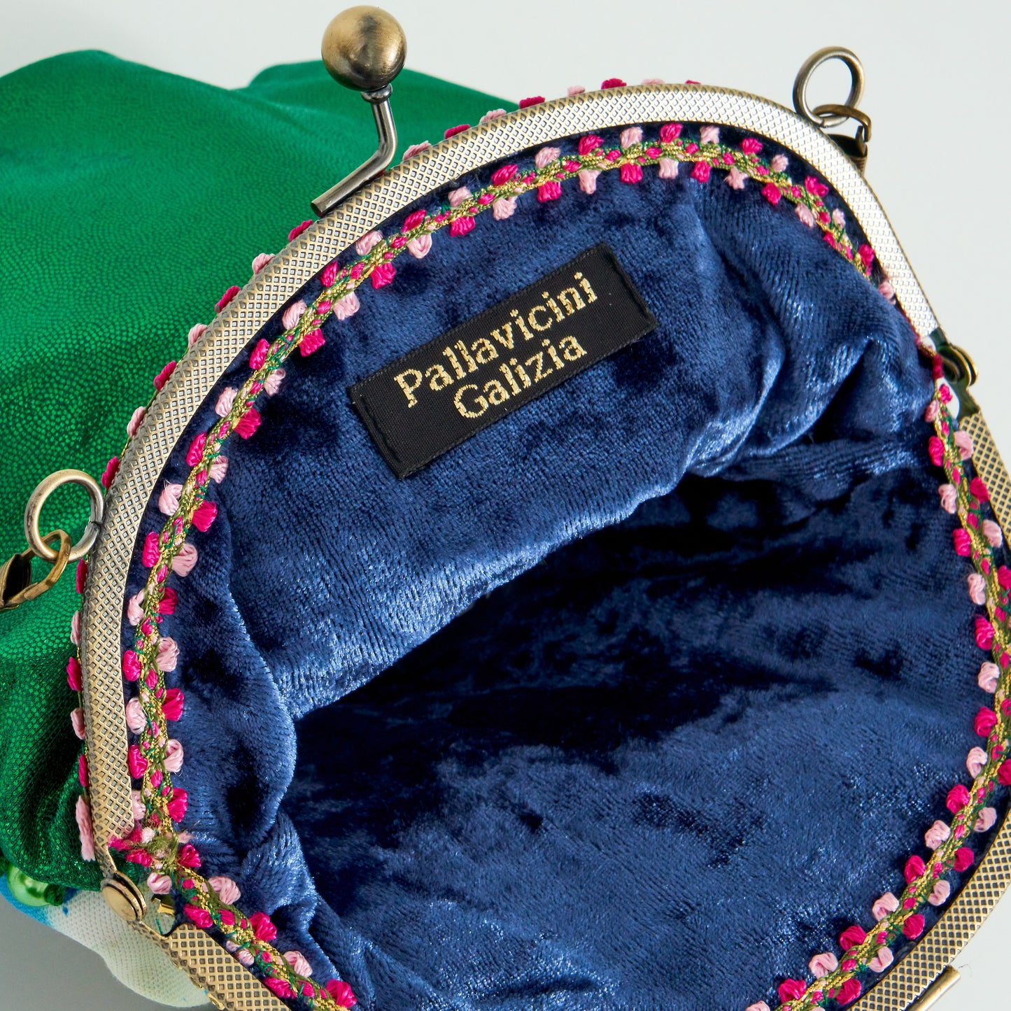 Meet Robyn. A shimmering green & Louis Vuitton fabric handbag with a diamanté vintage centrepiece.